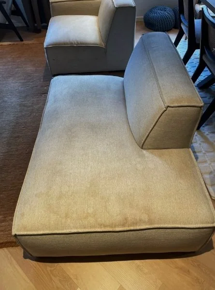 Beige sofa before cleaning