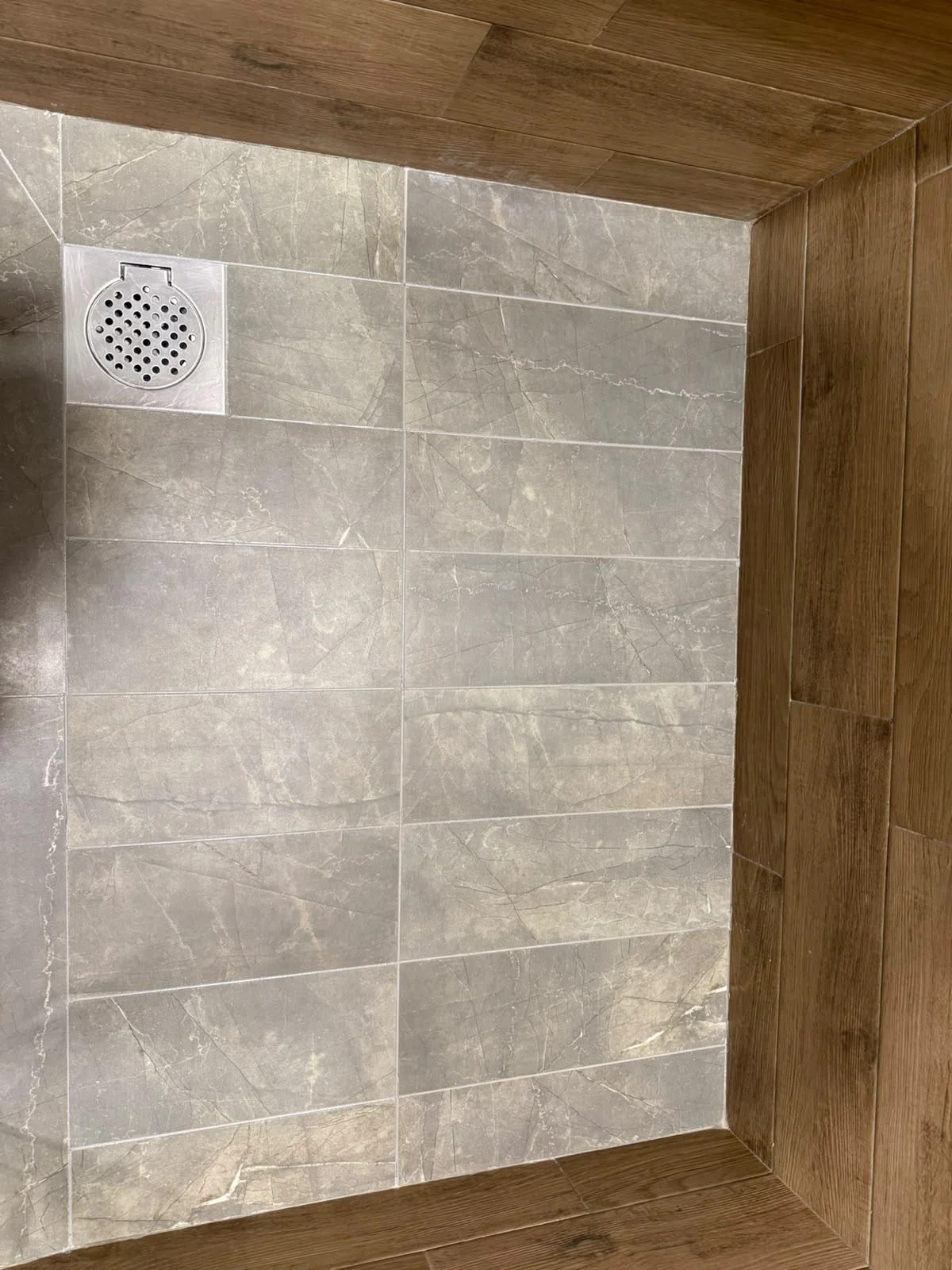 Bathroom tile & drain after cleaning