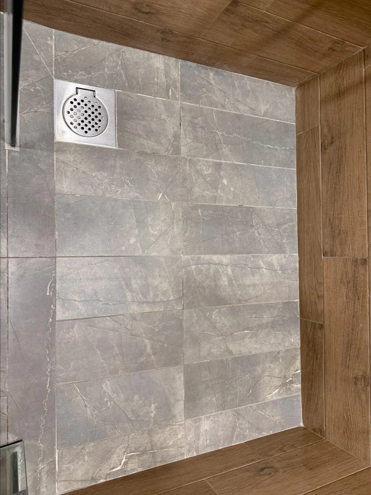 Bathroom tile & drain before cleaning