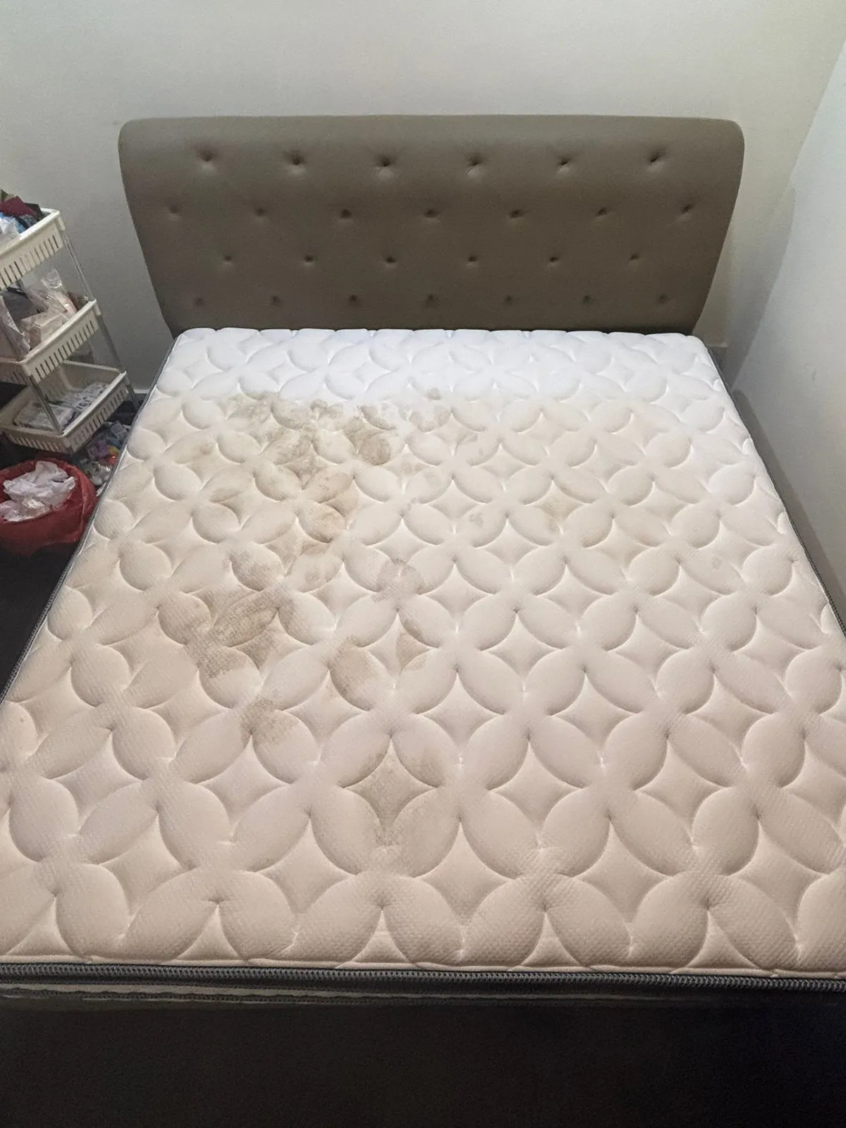 Stained mattress before cleaning