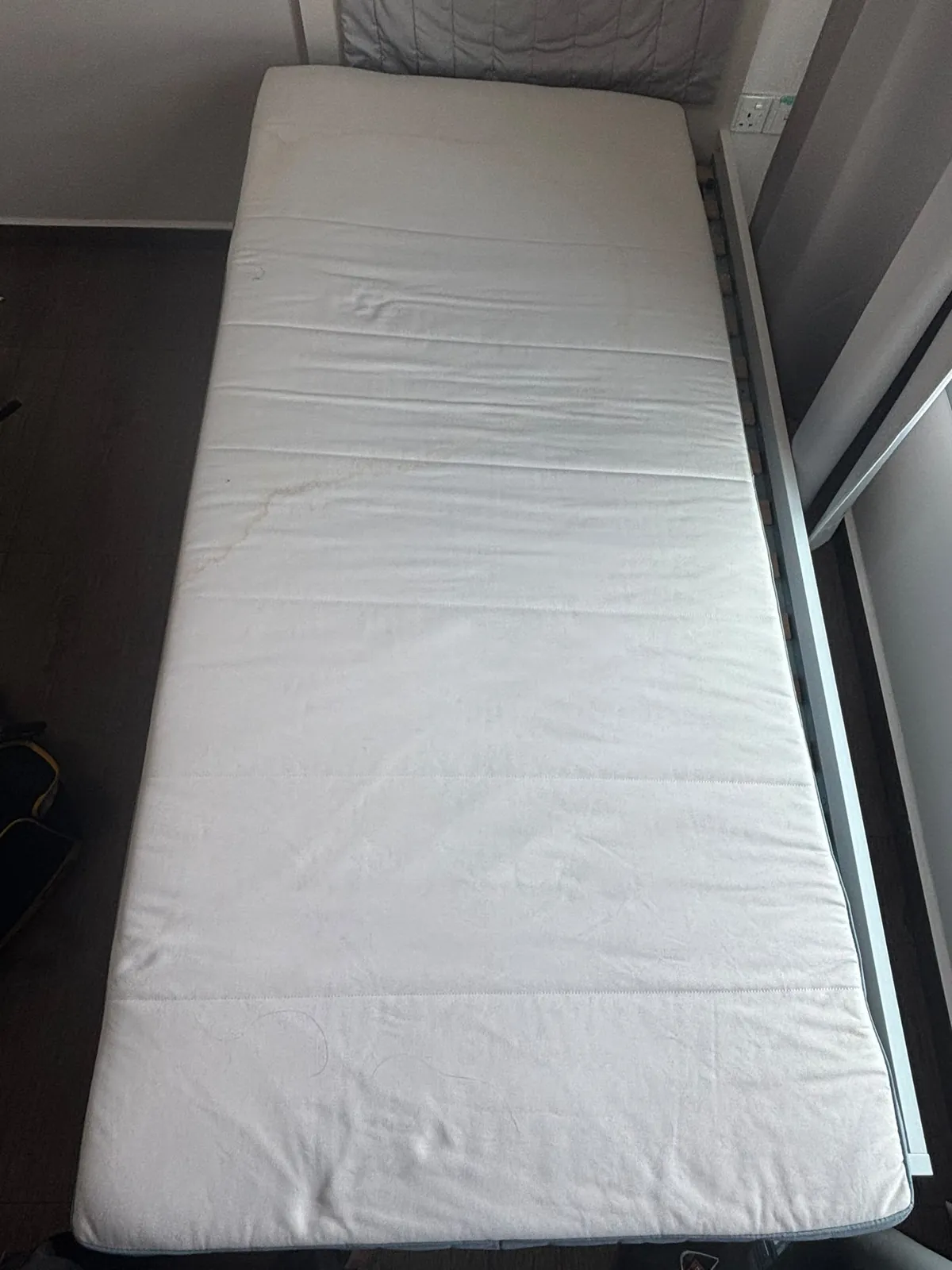 Single mattress before cleaning